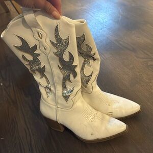White cowboy boots with sequence detail